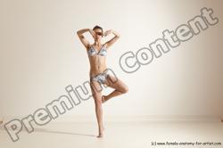 Swimsuit Gymnastic poses Woman White Moving poses Slim long brown Dynamic poses Academic